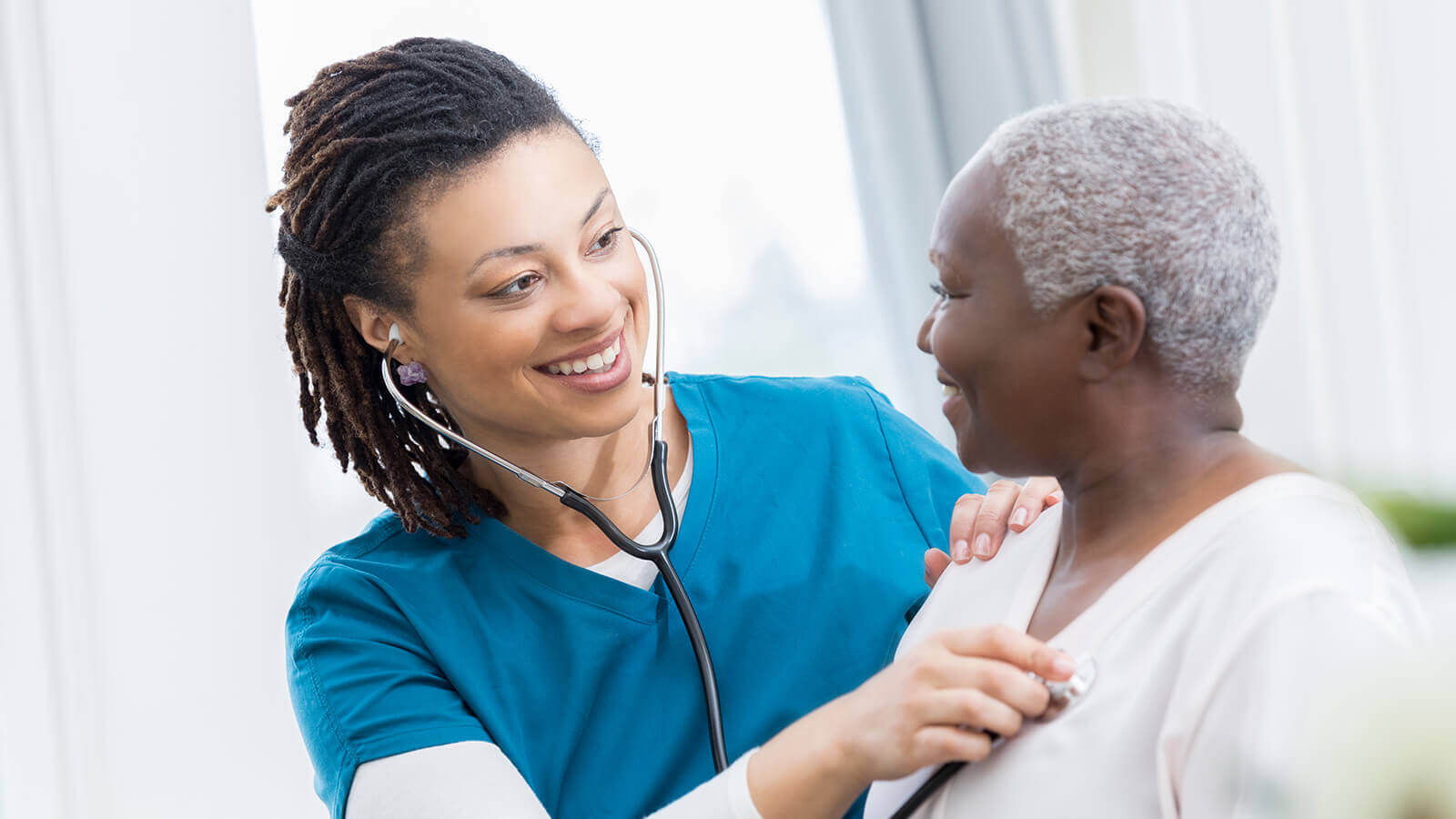 doctor assisting patient